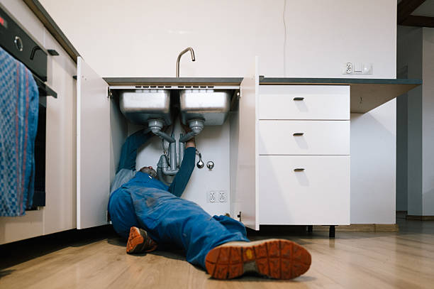 Professional Emergency Plumber technician working in Lawrence Township, NJ